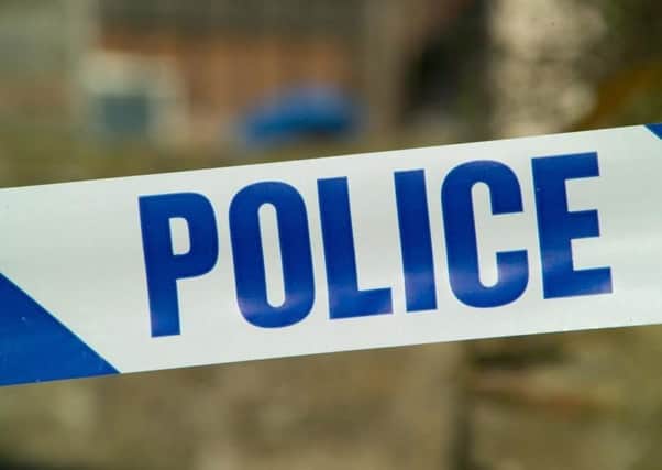 Police are appealing for witnesses after a man was assaulted and robbed in Kettering town centre
