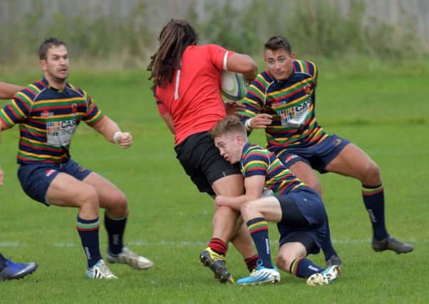 GETTING STUCK IN - action from Old Scouts 25-10 defeat to Newbold at Rushmere Road (Pictures: Dave Ikin)