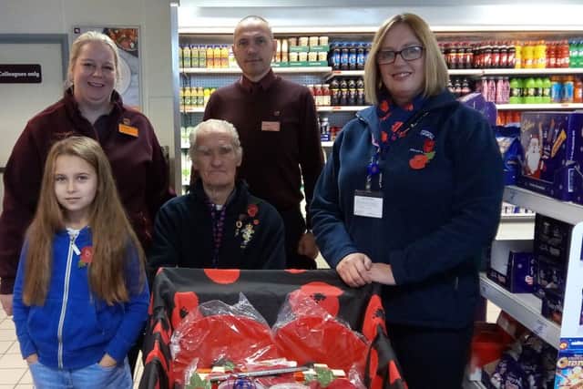 Fred Barrick with the commercial manager and store managers at Sainsbury's on Weedon road