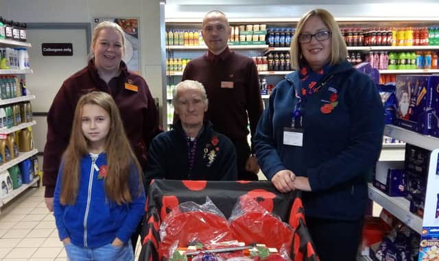 Fred Barrick with the commercial manager and store managers at Sainsbury's on Weedon road