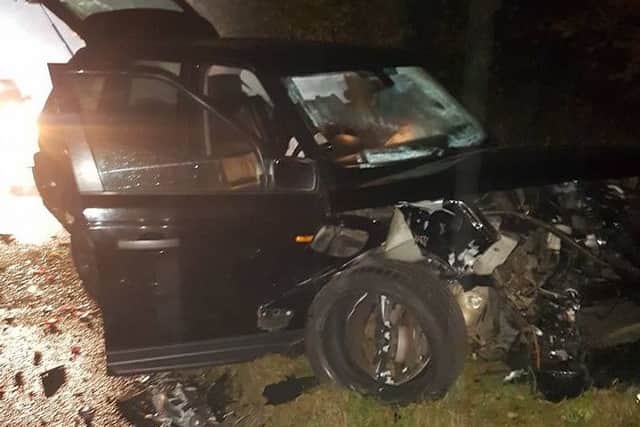 The black Range Rover involved in the crash. The driver of this car sustained minor injuries.