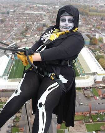 Emma Croxford, CAD Technician abseiling