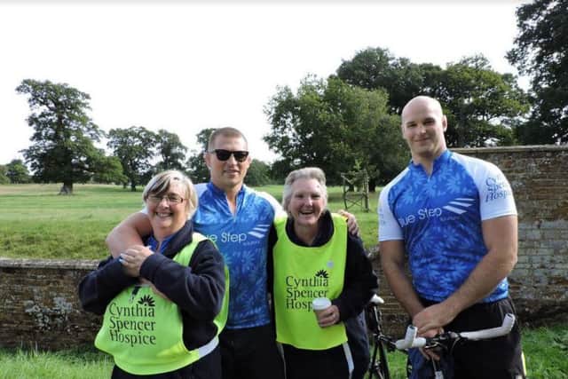 Annie and her friend Jayne Hills pose with Saints skipper Dylan Hartley and team-mate Sam Dickinson at the Cycle4Cynthia ride.