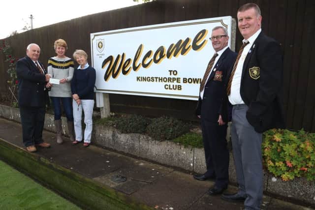 CASH BOOST - Kingsthorpe Bowls Club members have raised £2,000 for charity (Picture: Pete Norton)