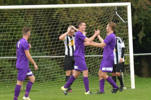 Daventry Town celebrate one of their goals in the 4-0 NFA Junior Cup win over Moulton (Pictures: Dave Ikin)