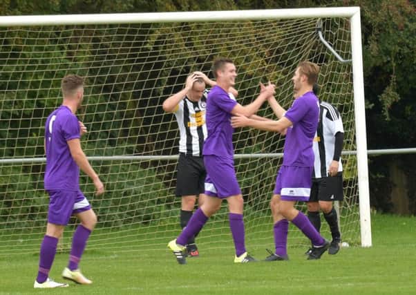 Daventry Town celebrate one of their goals in the 4-0 NFA Junior Cup win over Moulton (Pictures: Dave Ikin)