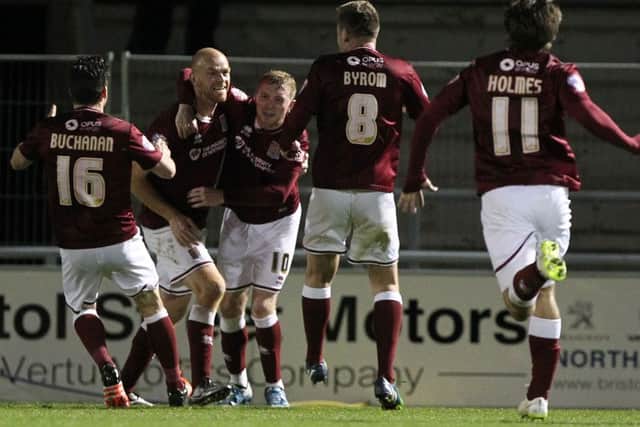 LEAVING IT LATE - Jason Taylor celebrate's scoring the Cobblers' 85th-minute equaliser against Northwich. Loan striker Domininc Calvert-Lewin scored the winner to make it 3-2 two minutes later