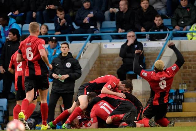 Brackley celebrated James Armson's stunning goal at Gillingham on Saturday