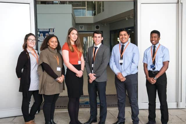Head boy and girl alongside their deputies