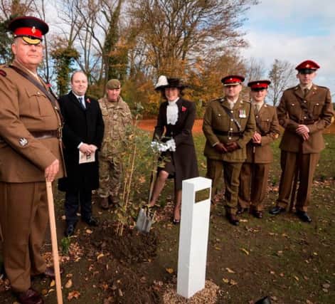 Six trees were planted in memory of fallen service teens