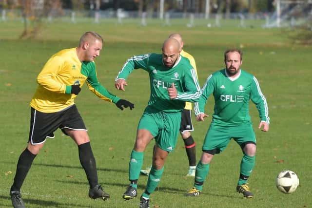 Action from Golden Horse Reserves' win over Travis Perkins
