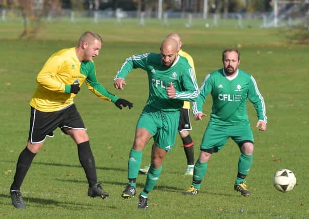 Action from Golden Horse Reserves' win over Travis Perkins