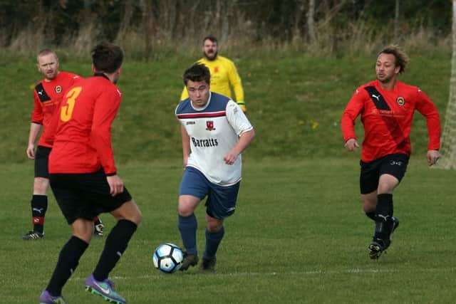 ON THE BALL - action from Spratton's 1-0 win over Wellingborough Rising Sun (Pictures: Alison Bagley)
