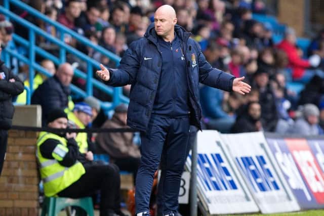 GALLING: Rob Page admitted it was 'a bitter pill to swallow' after Northampton's late defeat to Gillingham. Picture by Kirsty Edmonds