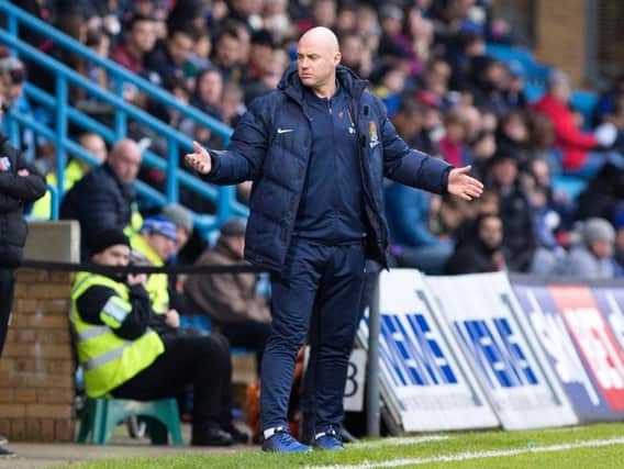 GALLING: Rob Page admitted it was 'a bitter pill to swallow' after Northampton's late defeat to Gillingham. Picture by Kirsty Edmonds
