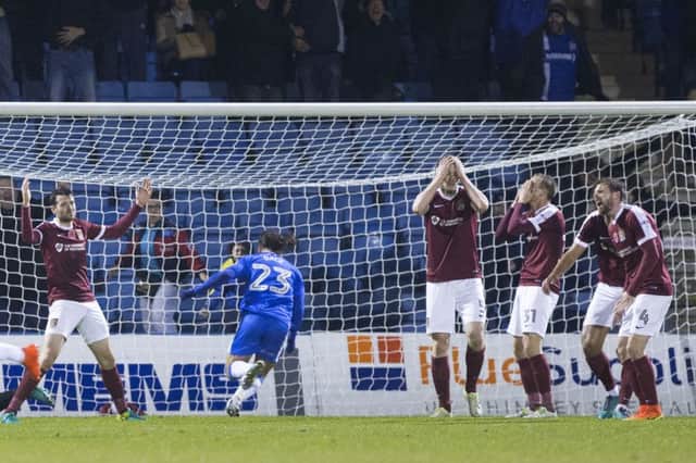 HEAD IN HANDS: It was late agony for the Cobblers on Saturday. Pictures: Kirsty Edmonds