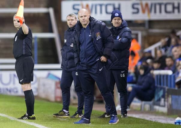 NIGHT TO FORGET - Rob Page watches his Cobblers team lose 3-0 to Peterborough last month