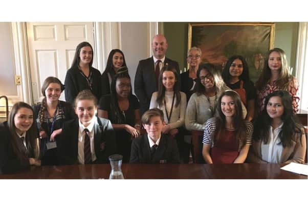 Pupils from Sir Christopher Hatton Academy in Wellingborough and Sponne School in Towcester with Northamptonshire County Council director for childrens services Lesley Hagger and Cllr Matthew Golby for national Takeover Challenge day.