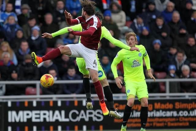 Action from the Cobblers' defeat to Peterborough