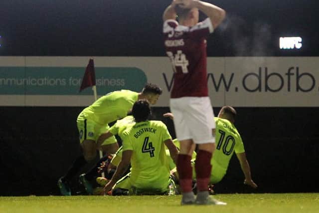 Peterborough scored their winning goal 30 seconds before the end of the game at Sixfields