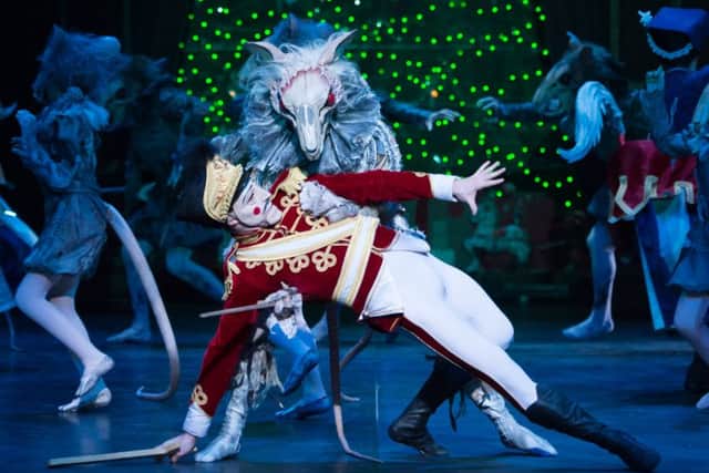 James Streeter as Mouse King & Max Westwell as the Nutcracker perform during English National Ballet's dress rehearsal of the Nutcracker at the Coliseum Theatre, London on December 10, 2014. Photo: Arnaud Stephenson PNL-160911-161105004
