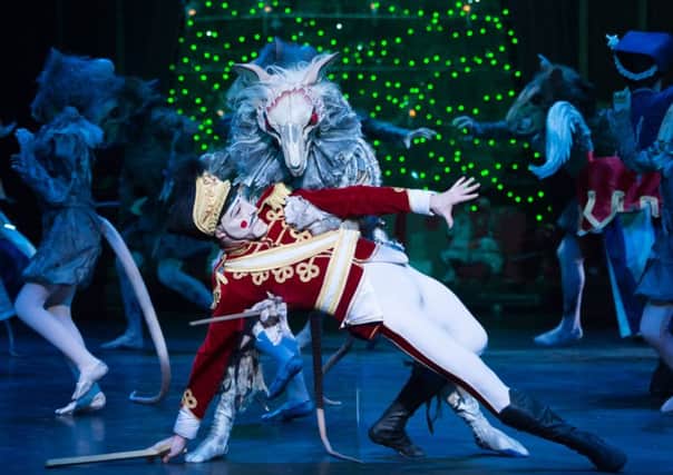 James Streeter as Mouse King & Max Westwell as the Nutcracker perform during English National Ballet's dress rehearsal of the Nutcracker at the Coliseum Theatre, London on December 10, 2014. Photo: Arnaud Stephenson PNL-160911-161105004