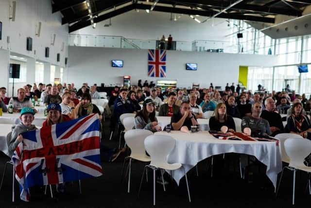 The audience watches the race at the Silverstone Wing