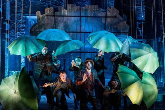 The company use an array of props to tell the story - including umbrellas. Picture: Manuel Harlan