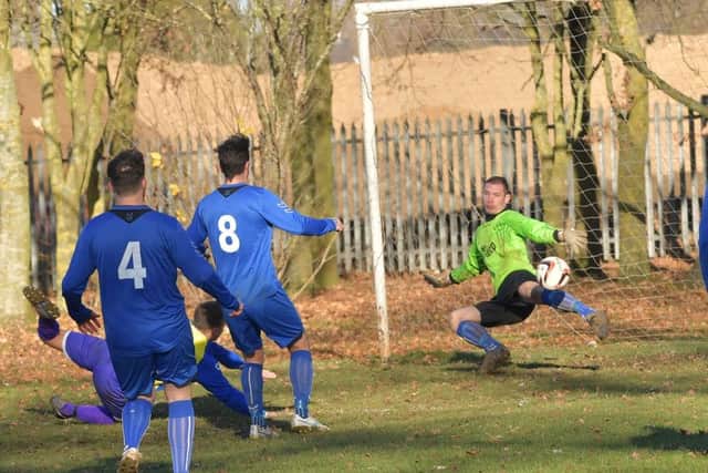 Action from the 3-3 draw between Midshire Electrical and Standens Barn