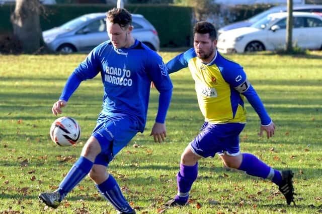 Action from the 3-3 draw between Midshire Electrical and Standens Barn