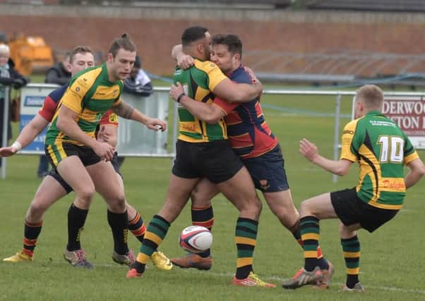 GIVE US A CUDDLE - action from ONs' win over Bugbrooke (Pictures: Dave Ikin)