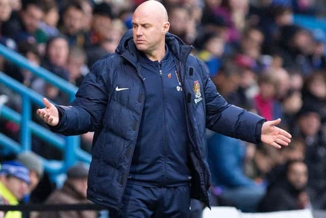 FRUSTRATING - it has been a difficult few weeks for Cobblers and boss Rob Page