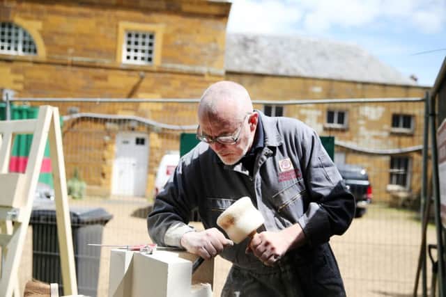 Craig Murphy from Underwood and Weston working on the restoration