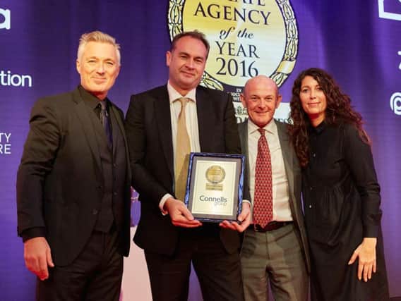 The team from Connells pick up the award