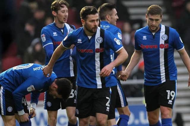 Rochdale's players celebrate their first equaliser