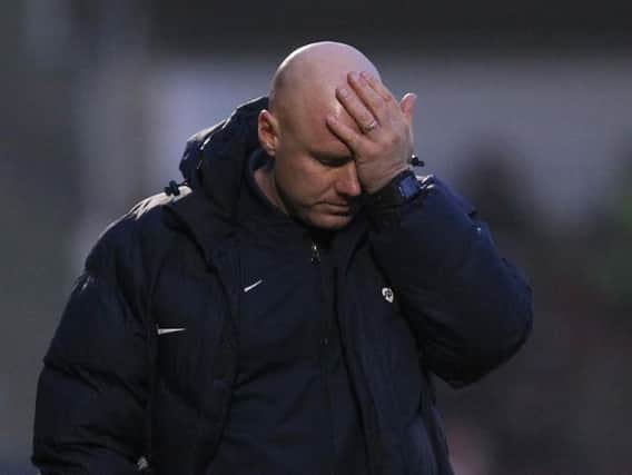 PAINFUL VIEWING - Rob Page watched his side slump to defeat against Rochdale at Sixfields (Picture: Sharon Lucey)