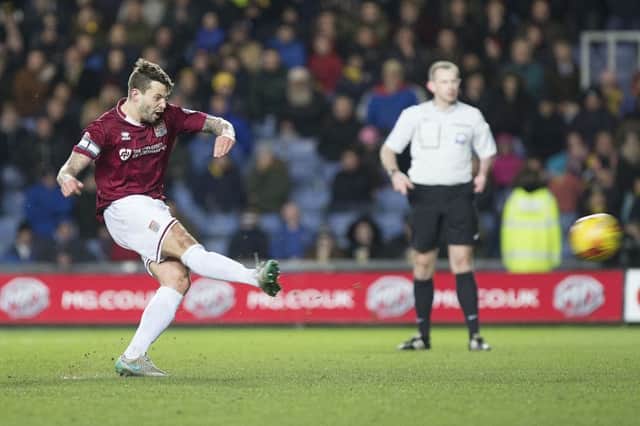 ON THE SPOT: Marc Richards lashed in a second-half penalty to ensure the Cobblers did the league double over Oxford last season