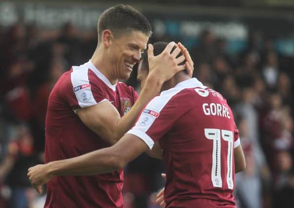 Alex Revell celebrates scoring his second goal against Bristol Rovers on October 1. He hasn't scored in the 13 games he has played since