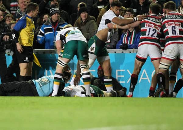 The Saints medical staff attended to George North on the pitch at Welford Road (picture: Sharon Lucey)
