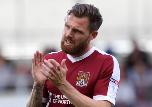 STAYING POSITIVE - Cobblers midfielder Paul Anderson