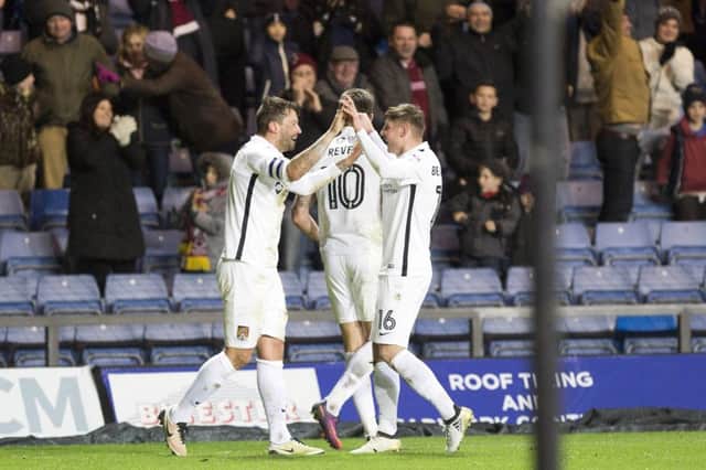 KNOCK-OUT BLOW: Marc Richards' late winner ensured it was a memorable Boxing Day for the Cobblers. Pictures: Kirsty Edmonds