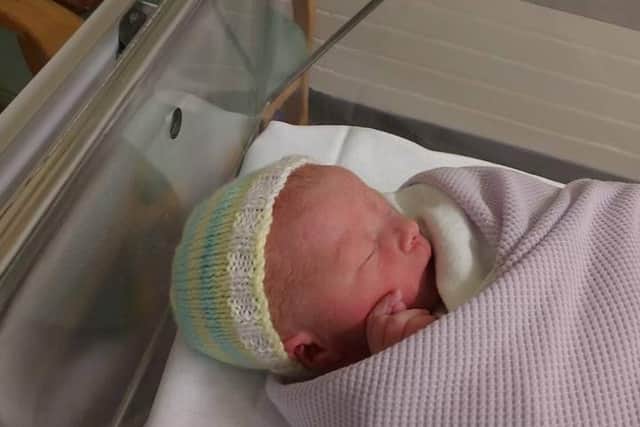 George PinfoldGeorge was born at 4.22pm on Christmas Day, weighing 6lbs 3oz.