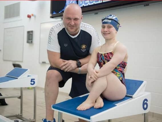 Ellie pictured today at Moulton College with her Paralympics coach Andy Sharp