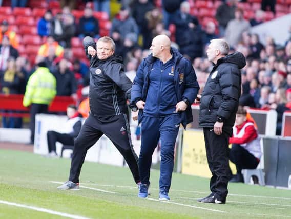 Rob Page and Chris Wilder show contrasting emotions after Kieron Freeman scores an 88th minute winner for Sheffield United. Picture: Kirsty Edmonds