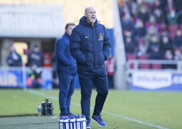 Rob Page shouts out instructions during the Cobblers' 2-1 defeat to Bradford City (Picture: Kirsty Edmonds)