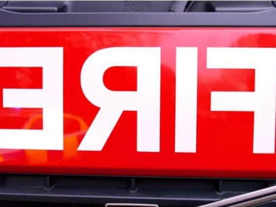 Fire crews tackle blaze to severely damaged single-decker bus in Northampton