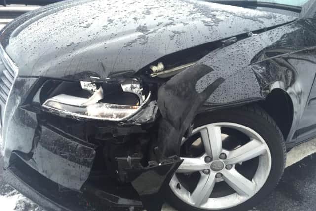 One driver was left with a damaged front grill after colliding with a fence at the McDonald's.