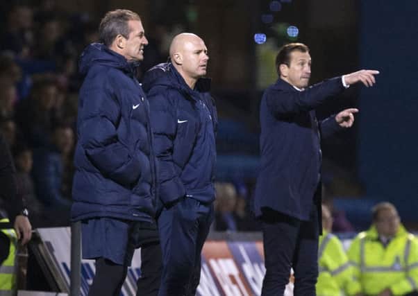 OUT WITH THE OLD, IN WITH THE NEW - Rob Page (middle) was sacked as Cobblers boss on Monday, and has been replaced by Justin Edinburgh (right)