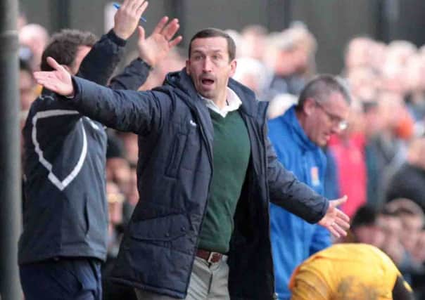 THE NEW BOSS - Justin Edinburgh has taken over as the new manager of the Cobblers
