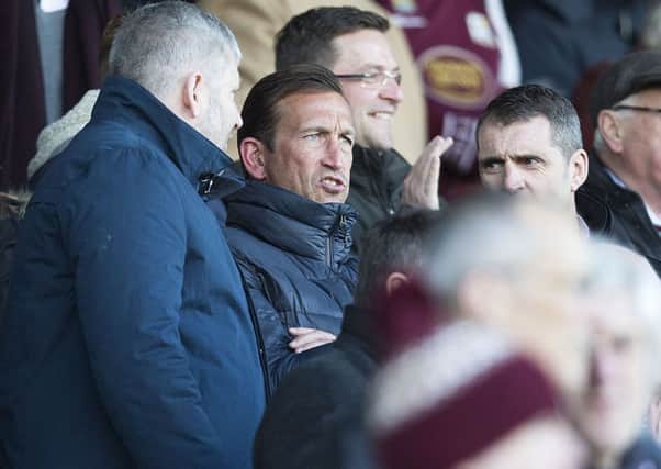 WATCHING BRIEF - Cobblers boss Justin Edinburgh watched his new team from the Sixfields directors box (Pictures: Kirsry Edmonds)